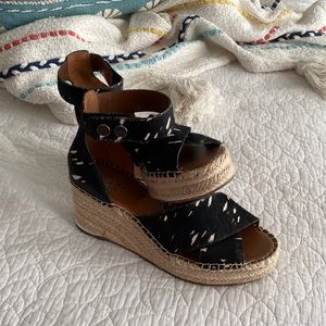 Super cute black n white Franco Sarto platform wedge cowhair Sz 8